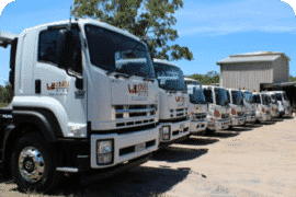 A line of Sunshine Coast skip bin hire trucks