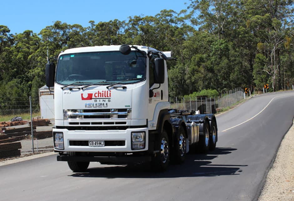 White Truck on The Road — Cheap Skip Bin Hire in Sunshine Coast, QLD